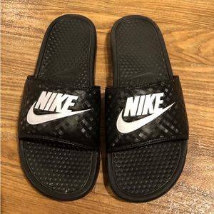 Women’s Nike slides.